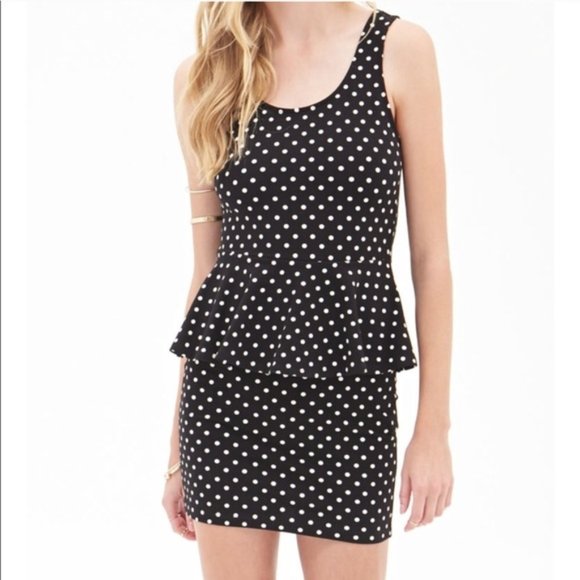 Black and White Polka Dot Peplum Dress - Picture 1 of 9